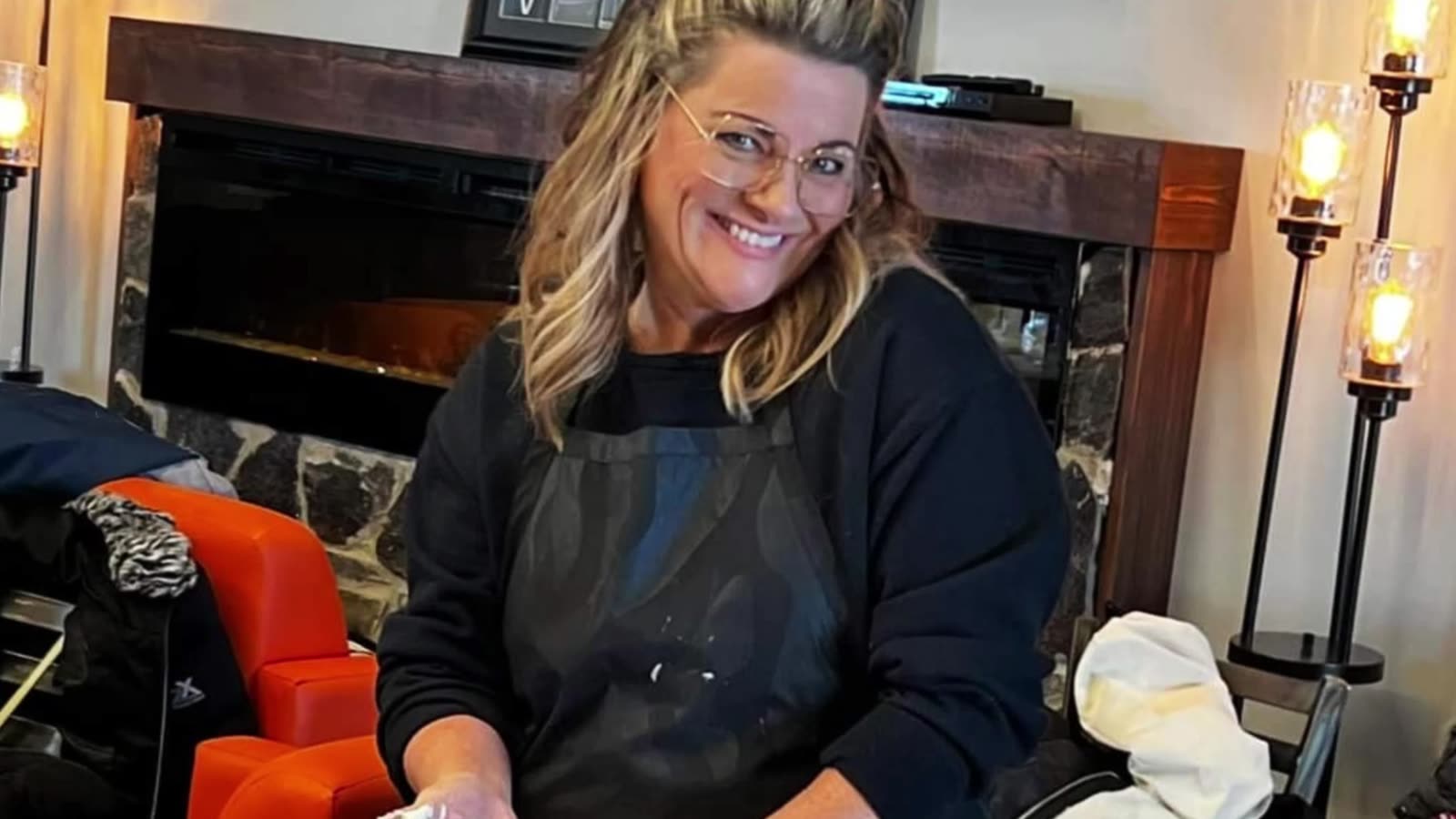 A woman smiling in the Venture lobby